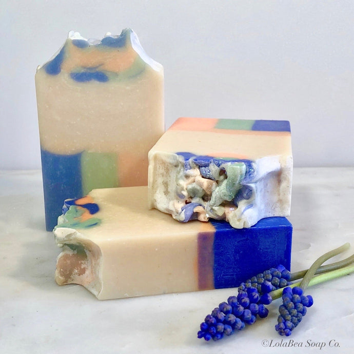 Apricotsicle Milk Soap. Three handmade soap bars. Cream with blue, green and peach stripe design.