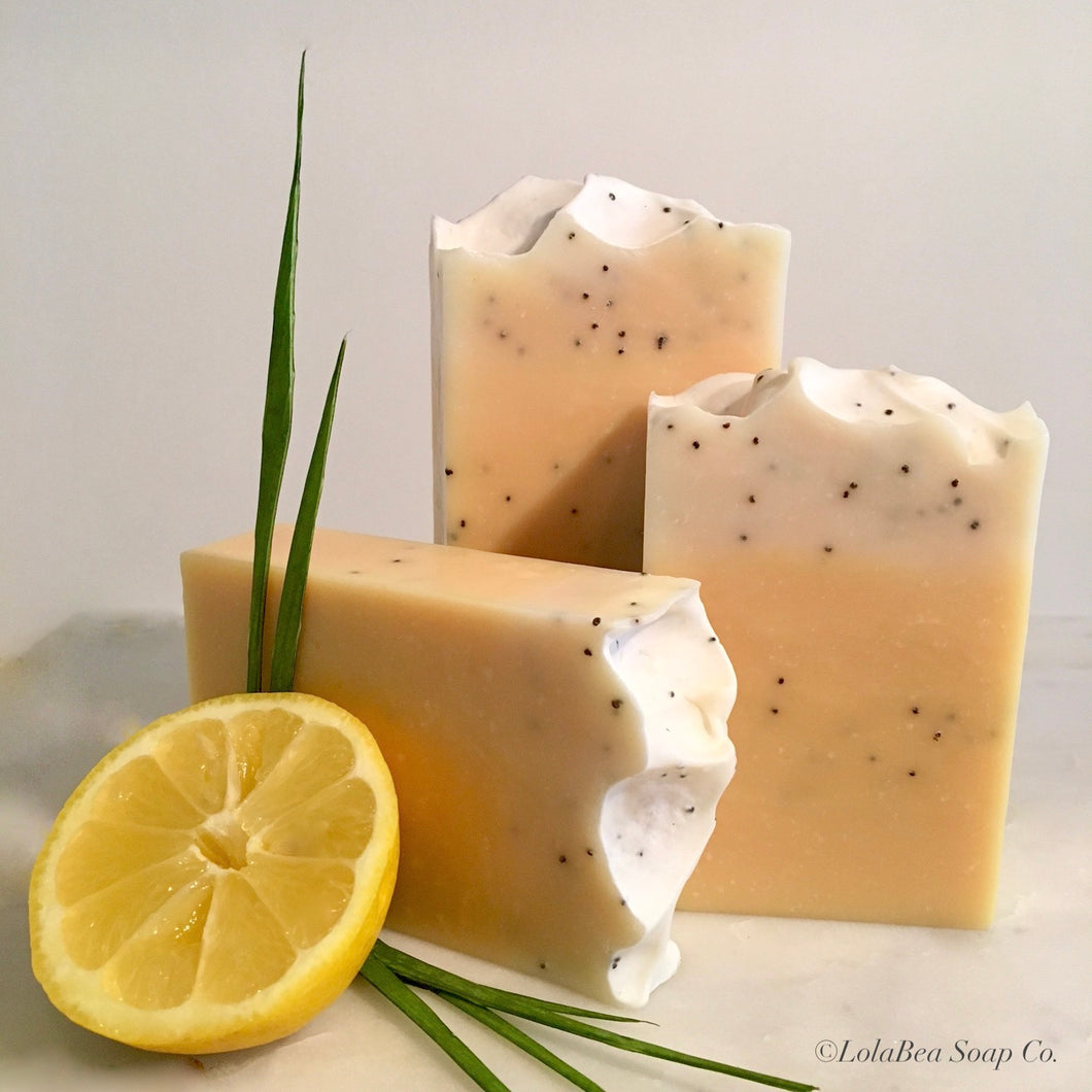 Lemongrass goat milk soap. Artisan soap bars. Light cream with dots of black poppy seeds.